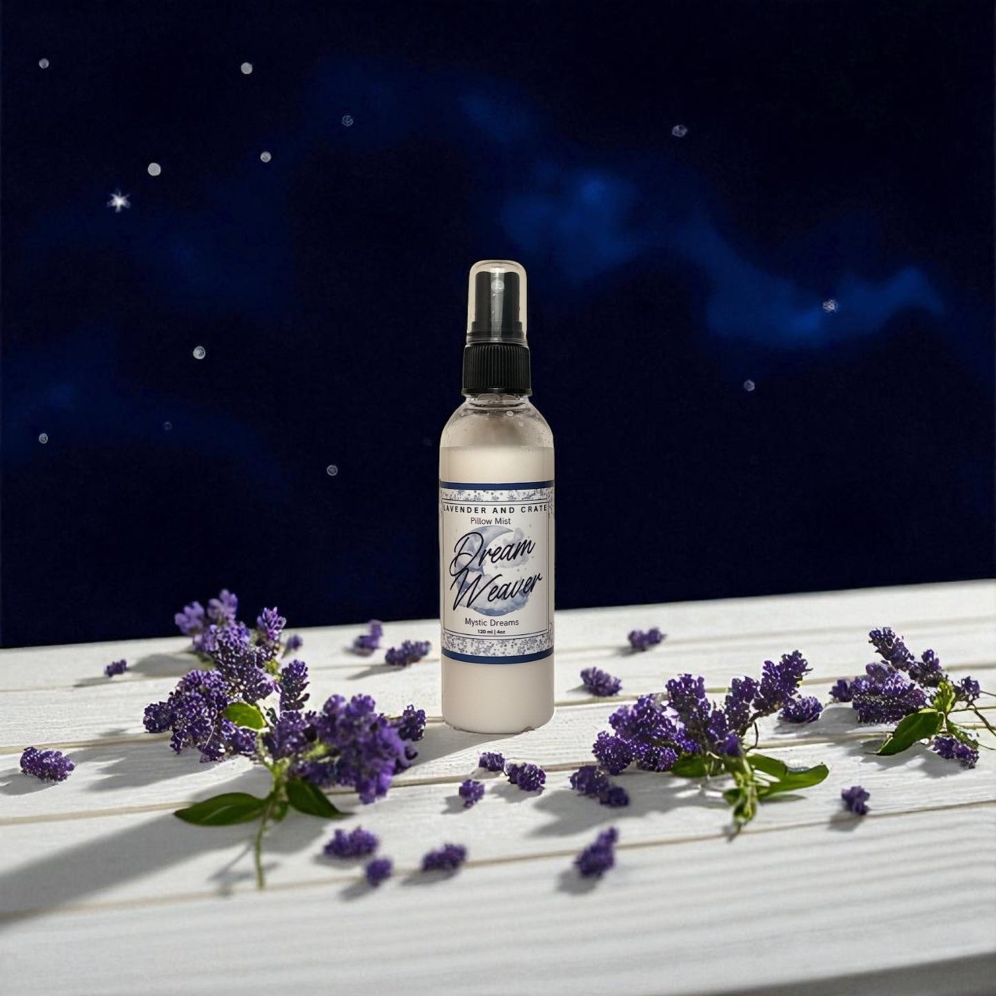 Bottle of 'Dream Weaver' spray with lavender flowers on a wooden surface at night.