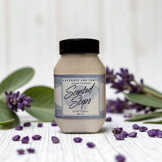 Bottle of 'Scented Steps' carpet freshener with lavender flowers and leaves on a light background